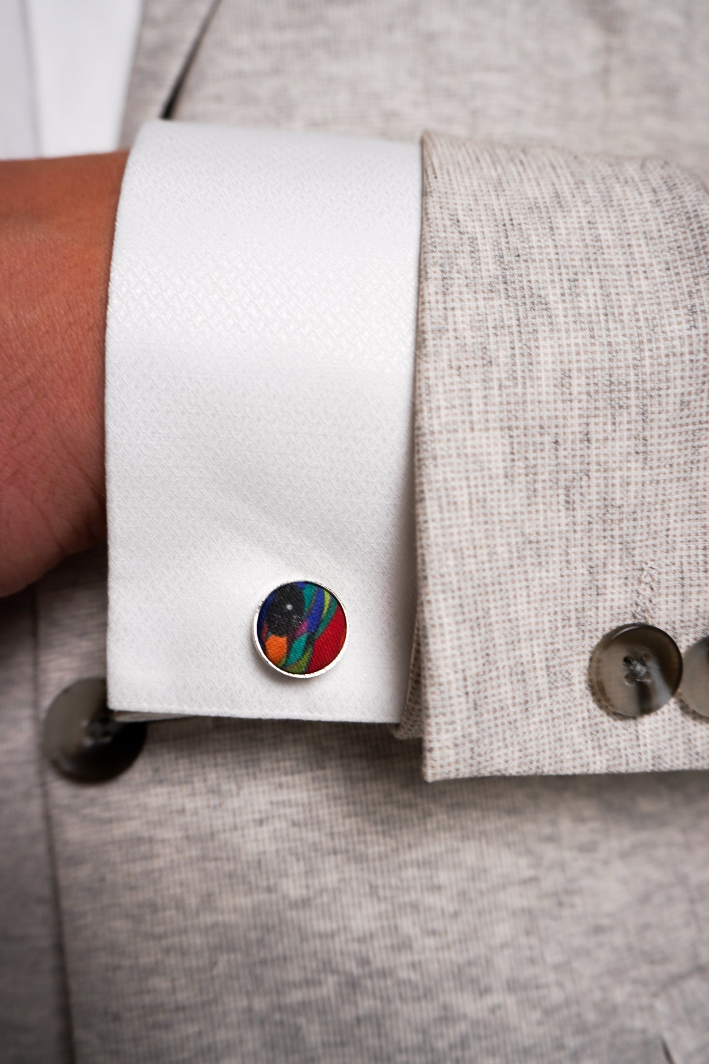 Silk cufflinks with silver accents